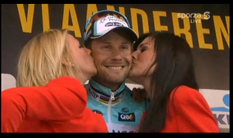 Boonen on the podium after his Flanders win. Reports hint that the brunette podium girl was the other occupant of the Ferrari